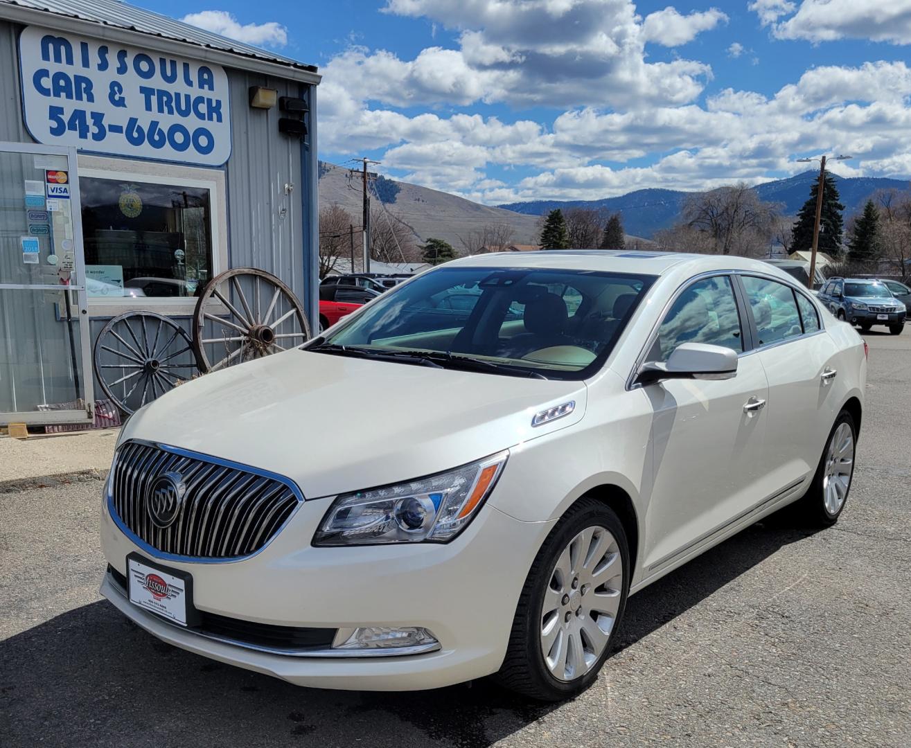 2014 Pearl White /Brown Buick LaCrosse PREMIUM (1G4GE5G33EF) with an 3.6L V6 engine, 6 Speed Auto transmission, located at 450 N Russell, Missoula, MT, 59801, (406) 543-6600, 46.874496, -114.017433 - Beautiful AWD Luxury Sedan. 3.6L V6 Engine. 6 Speed Automatic Transmission. Power Sunroof. Leather Heated Seats. Bluetooth. Memory Seats. Air. Cruise. Tilt. Power Windows and Locks. AM FM XM CD. Bose Sound. Remote Start. Adaptive Cruise Control. - Photo#6